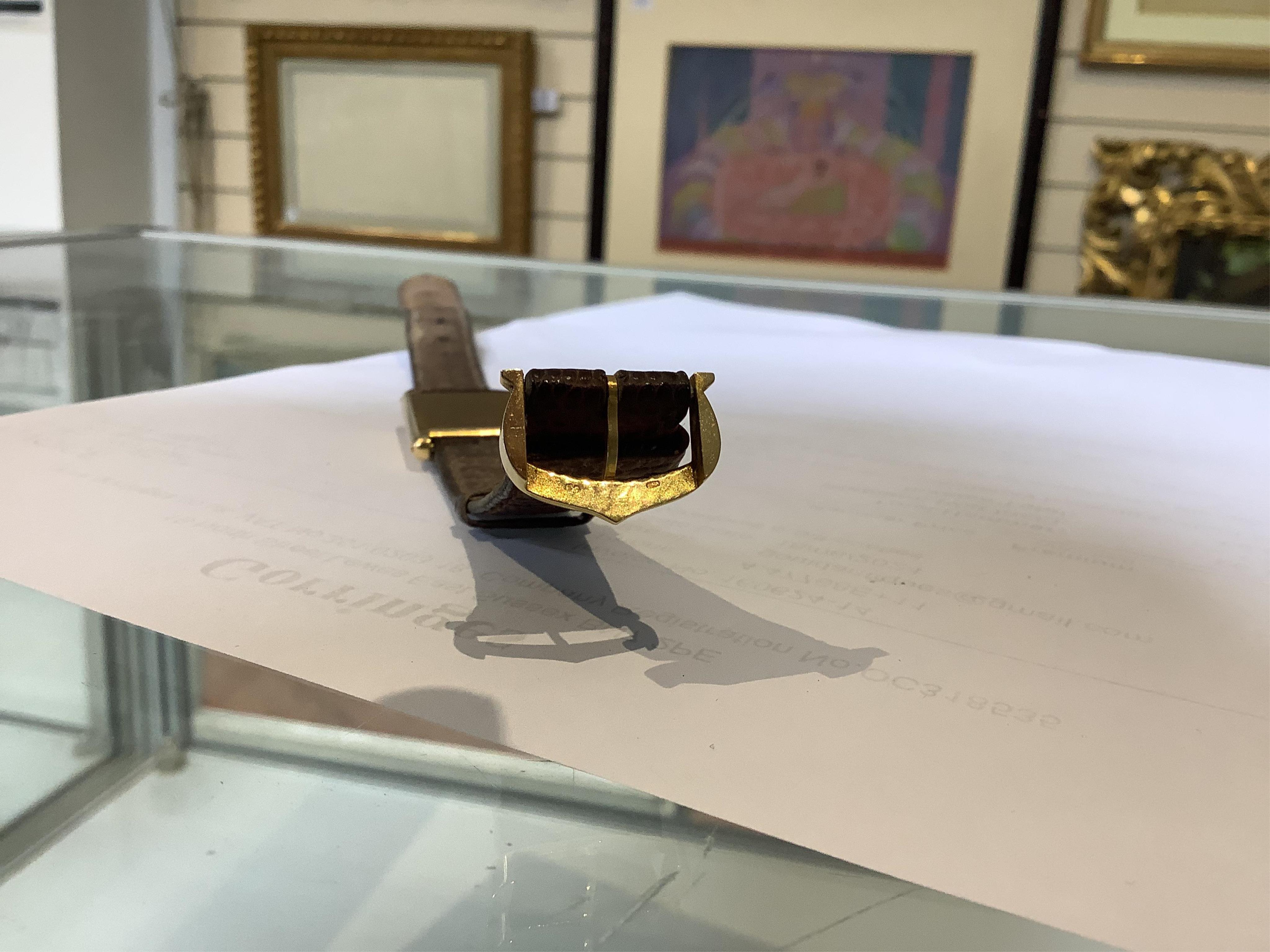 Richard Avedon (American, 1923-2004), a Cartier 18ct. gold tank manual wind wrist watch